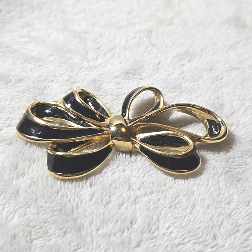 #504 Vintage gold tone bow brooch